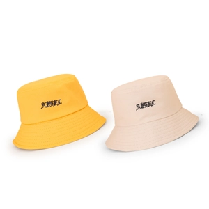 Classic bucket hats in yellow and off-white canvas with Gothic ANGEL embroidery detail