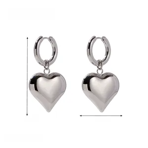 Detailed size view of silver heart drop earrings measuring 4.23cm height and 2.3cm width