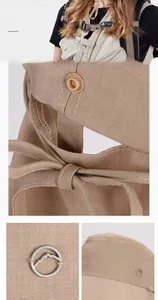 Détail d'un chapeau de soleil beige avec fente pour queue de cheval et nœud arrière