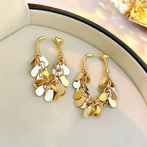 Exquisite gold-plated metal sequin fringe earrings with a stylish U-shaped dangle design