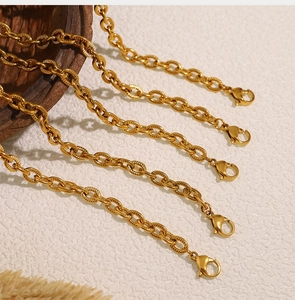 Detail of 18K gold-plated stainless steel chain bracelets with secure lobster clasps
