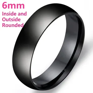 Detail shot of a 6mm matte black 316L stainless steel ring with inner-outer arc design