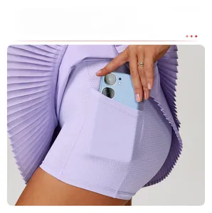 Detail of lavender sports skort featuring inner shorts with a side pocket for a smartphone