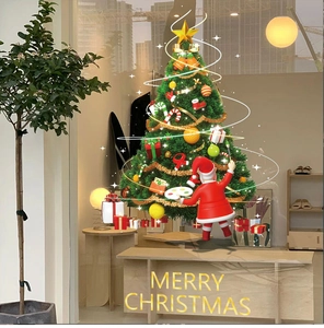 Detail of Christmas tree and Santa stickers on a modern glass window display