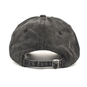 Detail of adjustable metal buckle and vintage washed fabric on back of baseball cap