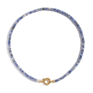 Detail of blue and white stone beaded necklace with a golden spring clasp