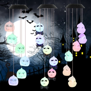 Solar powered Halloween wind chime with Jack Skellington and Sally pumpkin lanterns