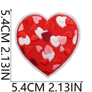 Detail view of heart embroidered patch showing size measurements 5.4cm on white backdrop