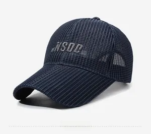 Detail view of navy blue mesh baseball cap with NSOC embroidery at 45-degree angle