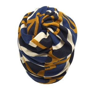 Deep blue and ginger knitted multi-use neck warmer with geometric abstract pattern