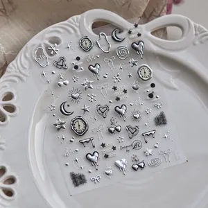 3D metallic silver nail decals featuring punk hearts stars and moons motifs