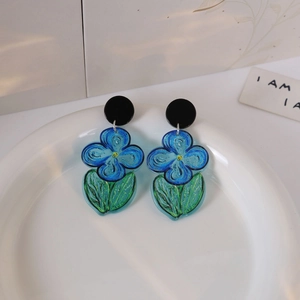 Elegant oil painting style blue flower earrings with green leaf details in acrylic