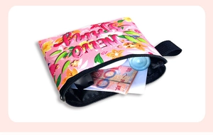 Pink floral coin purse with HELLO Lovely print, black zipper, and durable fabric texture