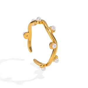 French vintage gold wave ring with multiple white pearls on a clean white background