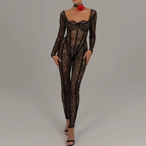 Detail of sheer black floral lace jumpsuit with structured bodice and square neckline