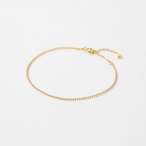Minimalist S925 sterling silver gold bead bracelet with lobster clasp on white background