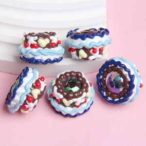 Detailed view of handmade miniature cake-shaped beads for DIY jewelry and phone chains