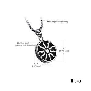 Detailed view of solar pendant showing black enamel rays and box chain texture