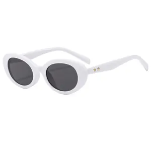 Retro oval sunglasses with thick white frames and gold star details on the side temples