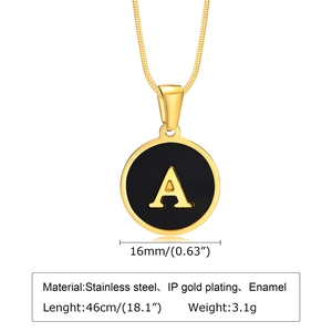 Detail of 18K gold plated necklace featuring a black enamel letter A round pendant