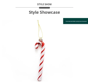 Detail view of a 13cm red and white painted candy cane Christmas tree ornament with glitter