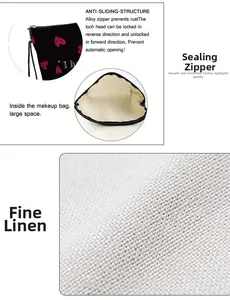 Detail of red heart makeup bag showing durable alloy zipper and linen fabric texture