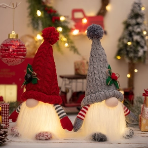 Lighted Christmas gnomes with knitted hats and warm LED bellies for festive home decor