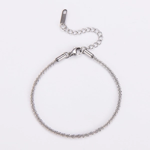 Detail of stainless steel star chain bracelet with lobster clasp and extension link