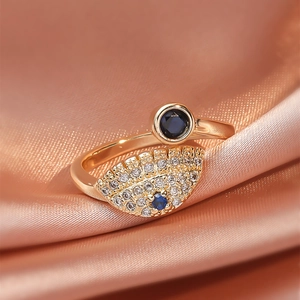 Fashionable rose gold evil eye open ring with blue sapphire and white zircon stones
