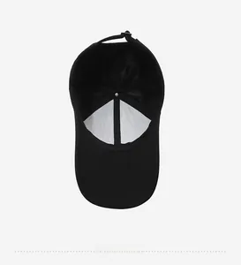 Detail view of the black baseball cap showing breathable mesh lining and inner structure