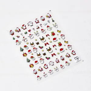 Vue détaillée des stickers à ongles 3D de Noël avec motifs en relief de Père Noël et renne