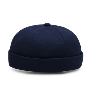 Classic navy blue cotton canvas docker cap with minimalist six-panel brimless design