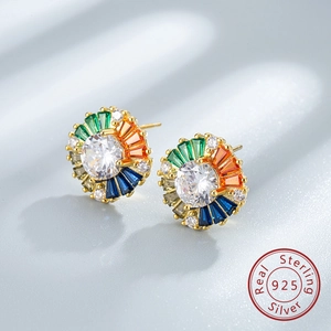 Macro view of 925 sterling silver colorful sunburst earrings with colorful gemstones