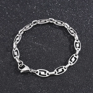 Detail of silver stainless steel hollow oval links with lobster clasp closure