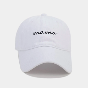 Detail shot of black mama embroidery on a white vintage washed cotton baseball cap