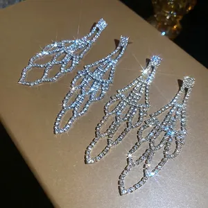 Elegant hollow long tassel earrings with sparkling rhinestones in silver and gold tone