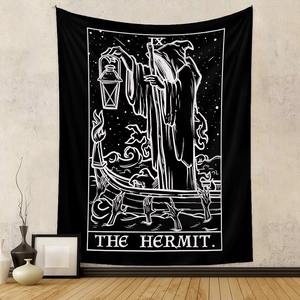 Detail of The Hermit tarot tapestry with intricate black and white line art on fabric