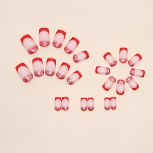 Red French tip press-on nails with silver glitter gradient in medium square shape