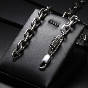 Industrial style stainless steel O-chain necklace with spring detail and lobster clasp