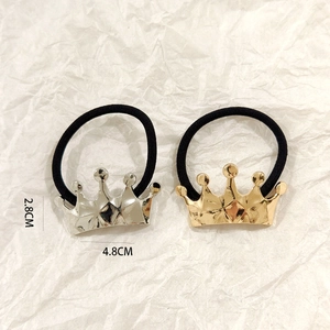 Detail of gold and silver hollow crown hair ties with 2.8cm and 4.8cm size measurements