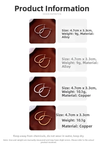 Detailed view of large teardrop earrings in gold and silver finish with size measurements