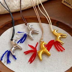 Minimalist horse pendant necklace with crystal bead tail and metallic finish