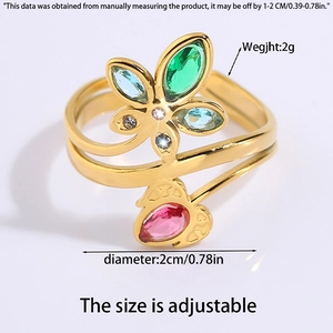 Detail view of adjustable gold titanium ring with butterfly motif and size measurements