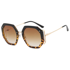 Octagonal oversized sunglasses with leopard print frames and gradient brown lenses