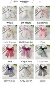 Detailed grid showing twelve colors of organza hair ties with black contrast stitching