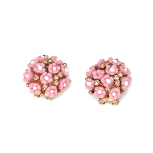Pink ceramic flower stud earrings with sparkling rhinestones in golden setting