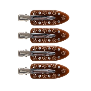 Detailed view of four brown resin flower hair clips with rhinestones on white backdrop