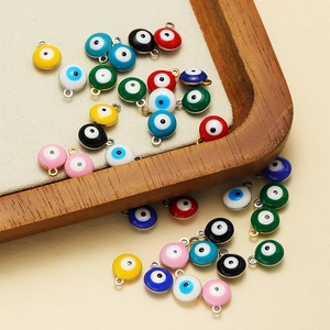 Colorful enamel evil eye charms in various colors for DIY necklace and bracelet jewelry making
