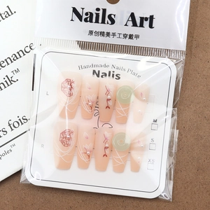 Handmade Chinese style press-on nails with magnolia flowers and red window patterns