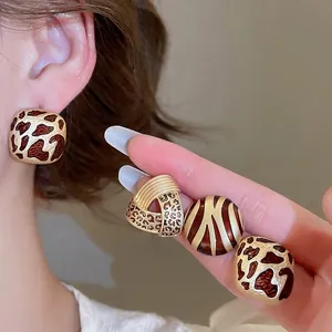 Vintage leopard print geometric earring set with round and square golden metal designs